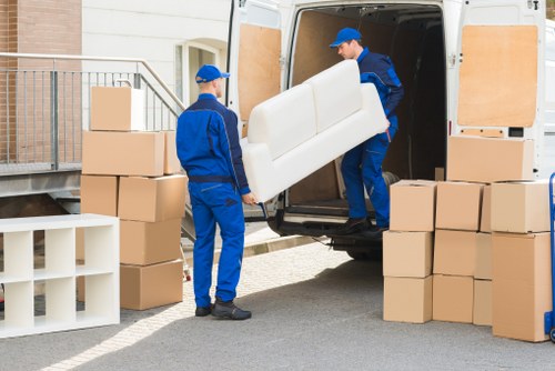 Local house removals service in Kingston Upon Thames with moving boxes and furniture