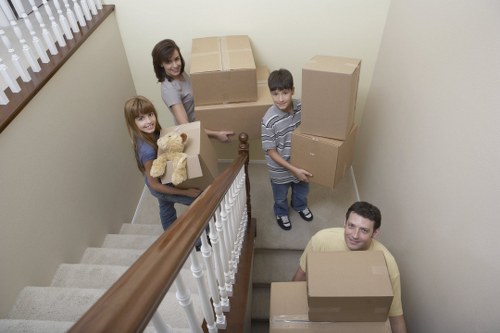 Commercial office movers handling desks and equipment
